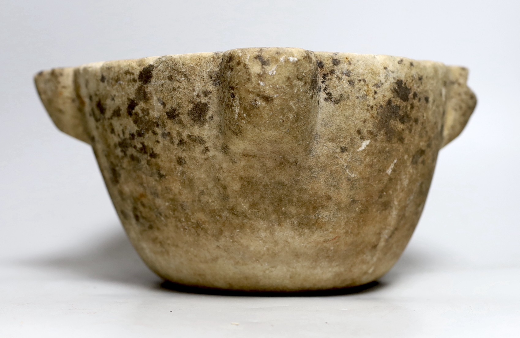 A 17th/18th century carved marble mortar, 31cm